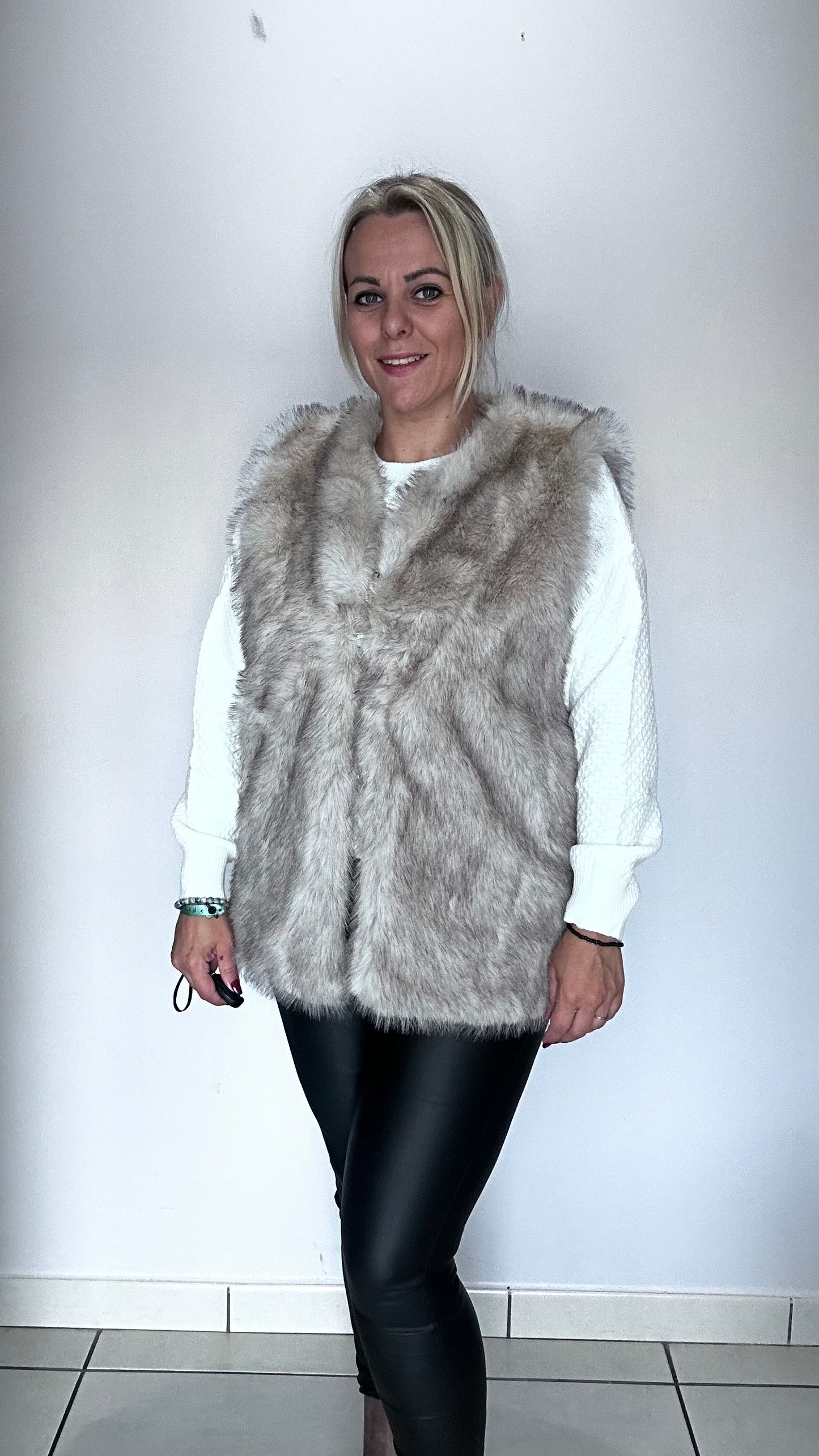 🐆 Gilet long en fausse fourrure