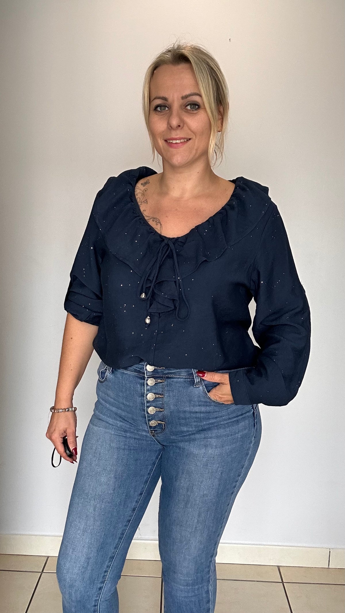 Blouse col volant