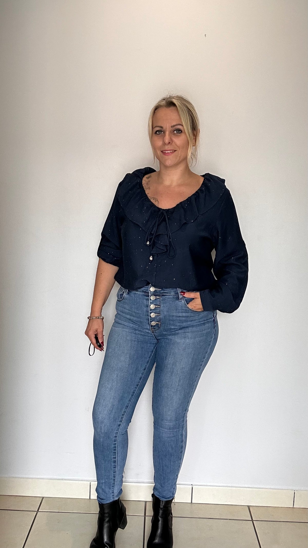 Blouse col volant