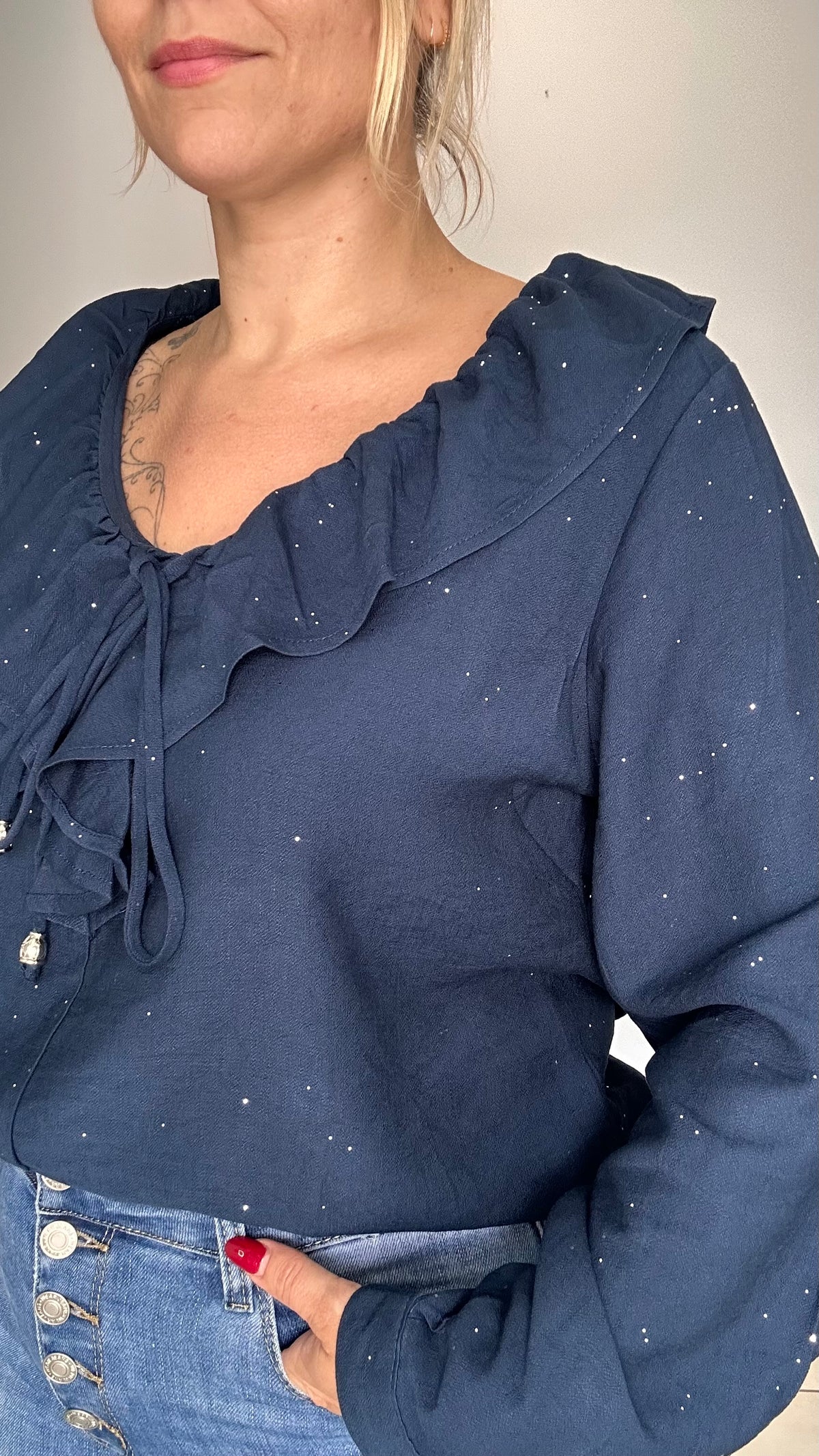 Blouse col volant