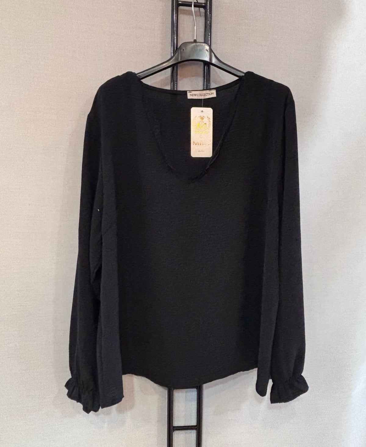 Blouse élégante bordée de dentelle ✨