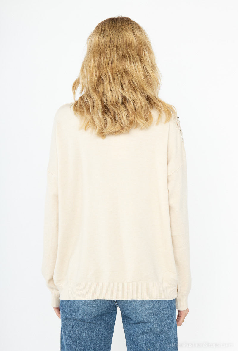 Pull en maille fluide oversize avec détail strasses et perles transparence